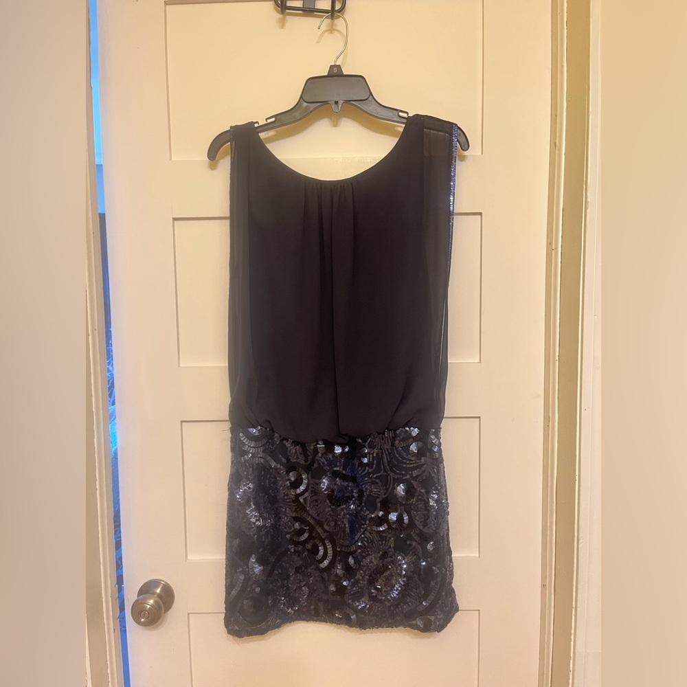 Navy blue one piece special occasion dress. Was size 8 and tailored to size 6.